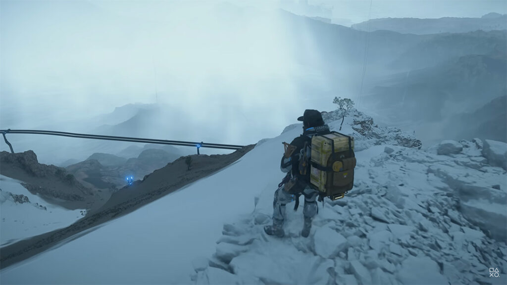 Death Stranding 2: On The Beach - Sam overlooking a monorail