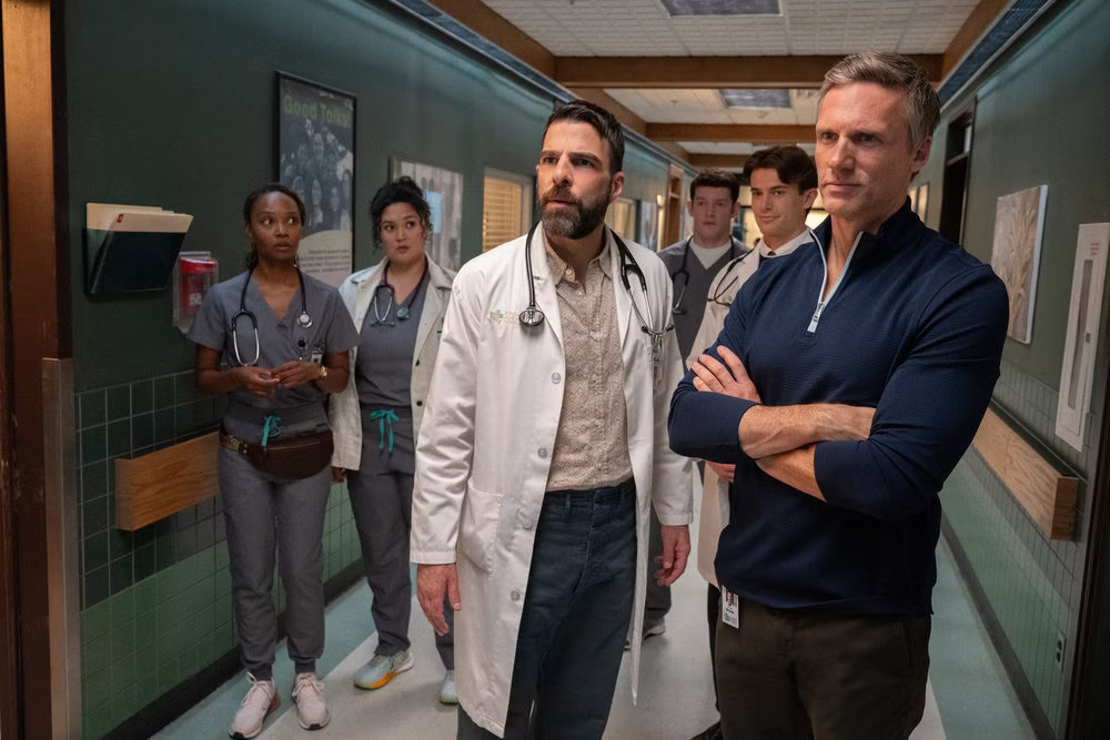 Brilliant Minds Season 2, Episode 1: Dr. Kinney, Dr. Dang, Dr. Wolf, Dr. Markus, Dr. Porter and Dr. Nichols in the hallway of the hospital facing a patient (off screen)