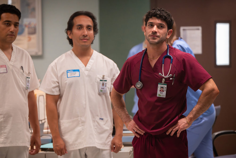 Brilliant Minds - Nurse Nico Silva standing next to two other nurses