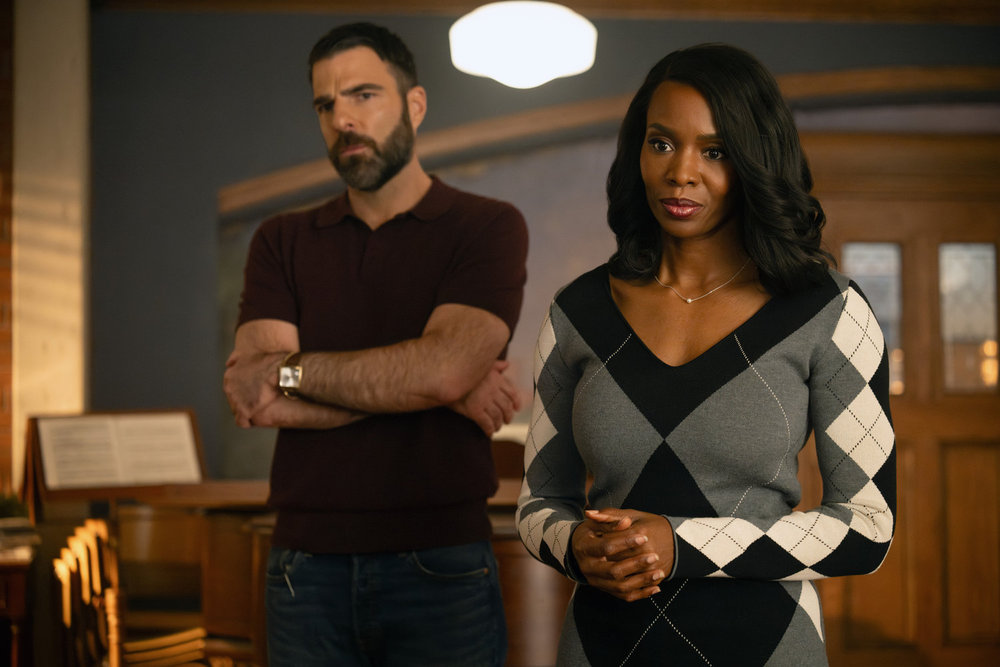 Oliver and Carol standing side by side